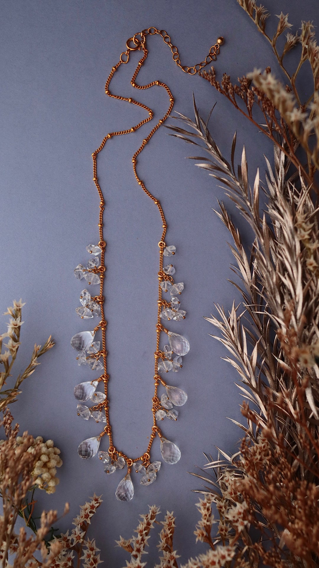 Crystal drop and double point crystal round necklace