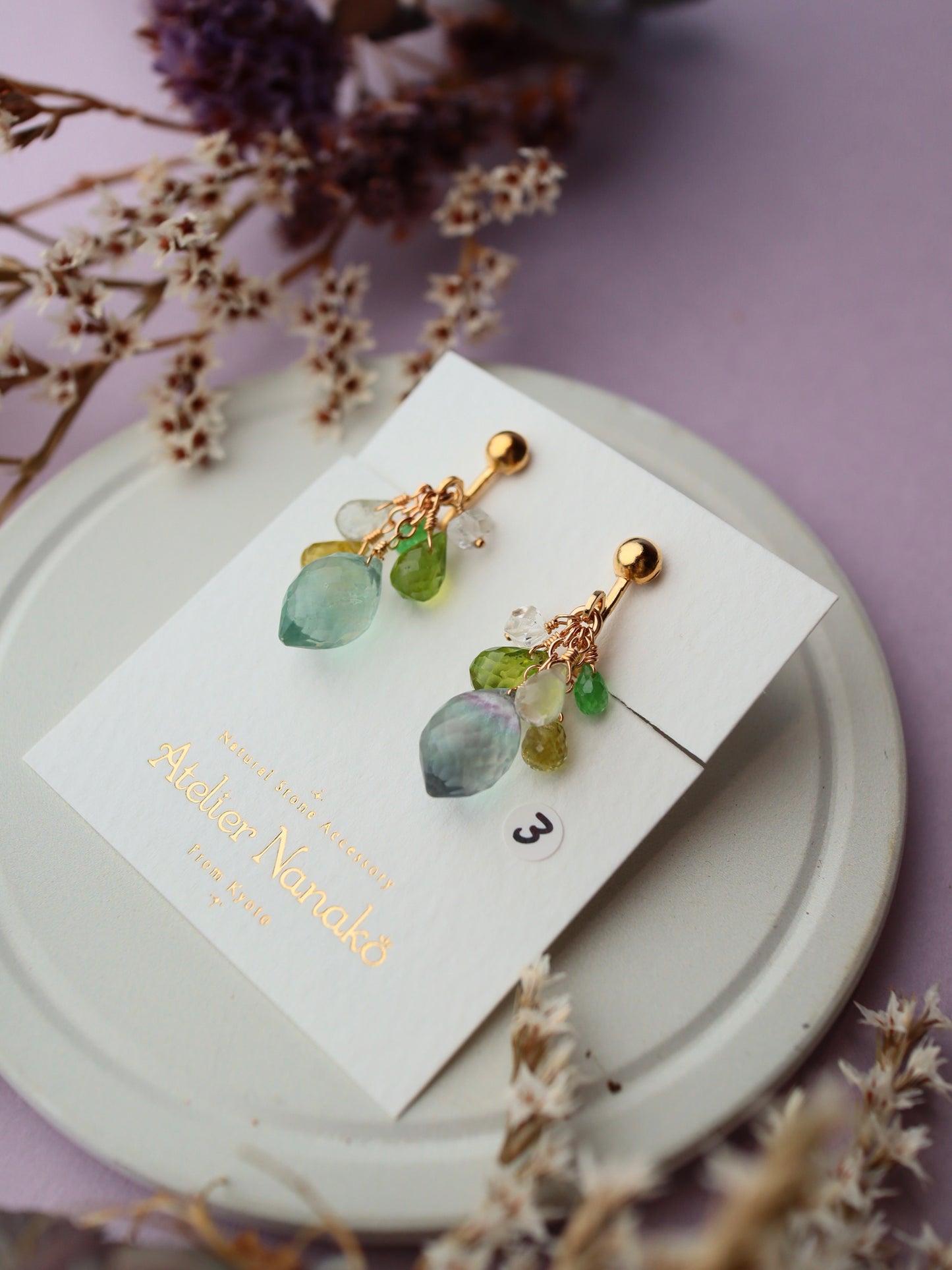 ③ Fluorite and yellow-green stone earrings