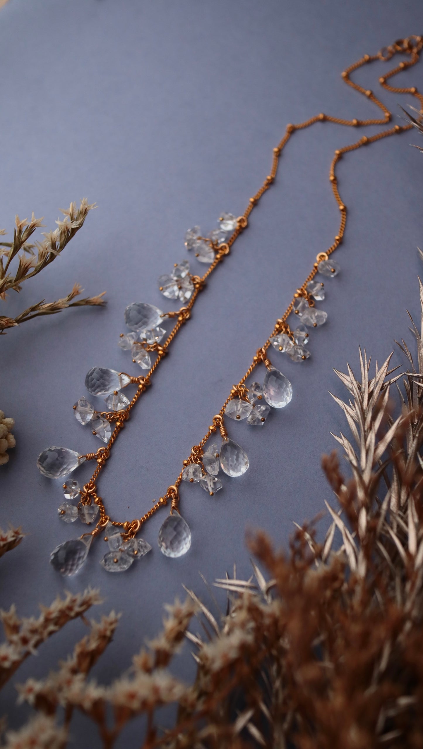 Crystal drop and double point crystal round necklace