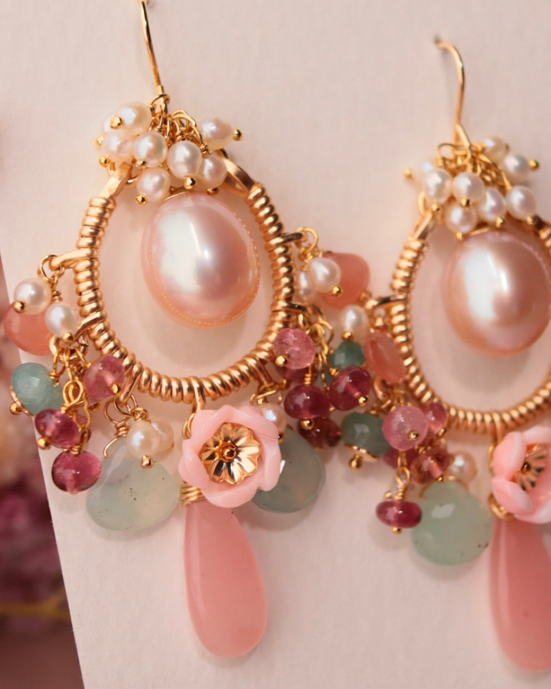 Romantic-hued chandelier earrings with large freshwater pearls