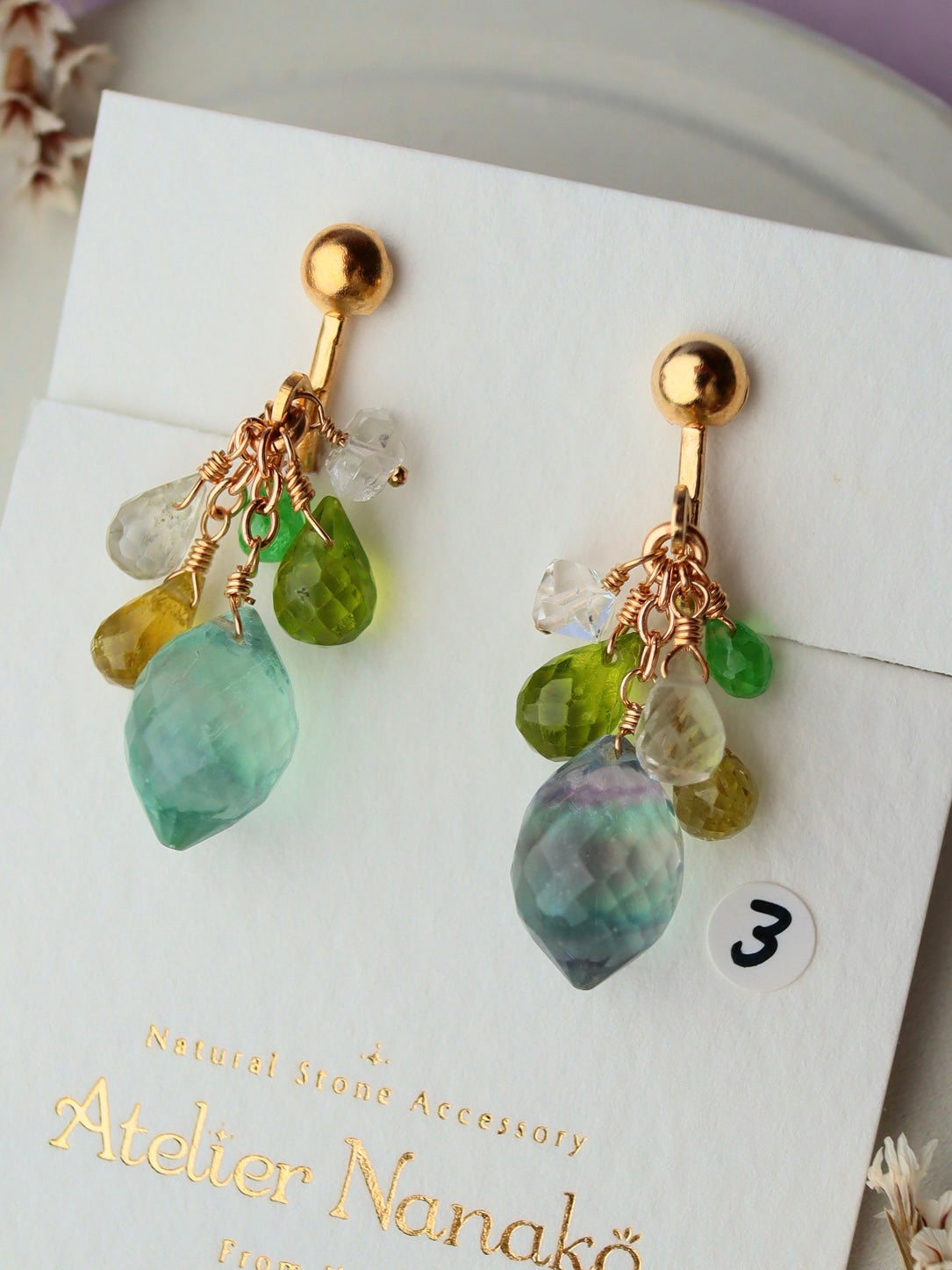 ③ Fluorite and yellow-green stone earrings
