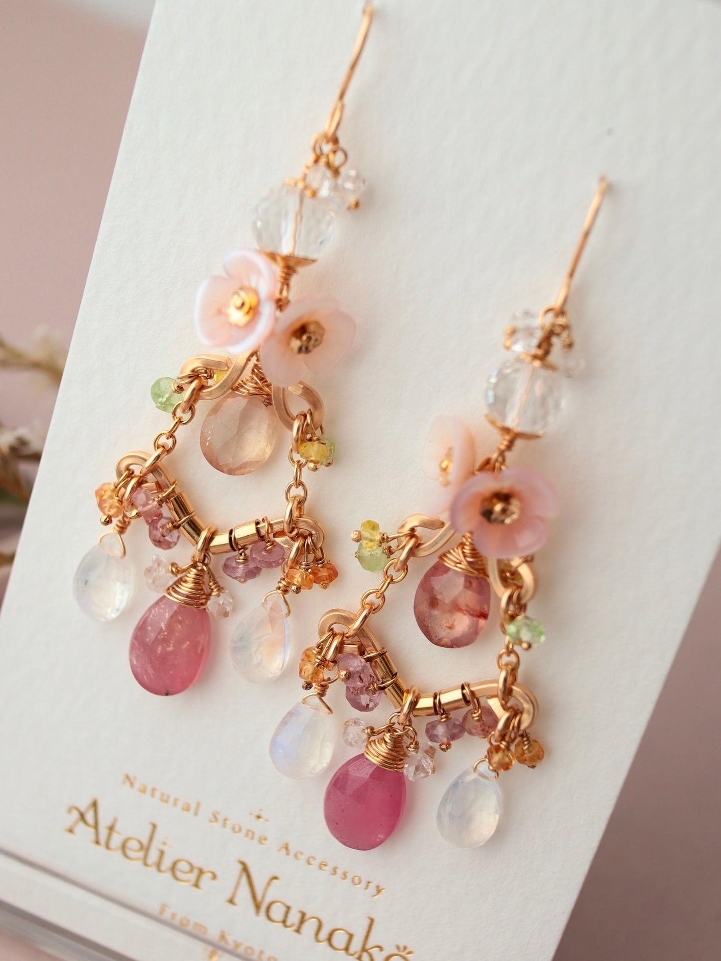 ① Pink sapphire chandelier earrings