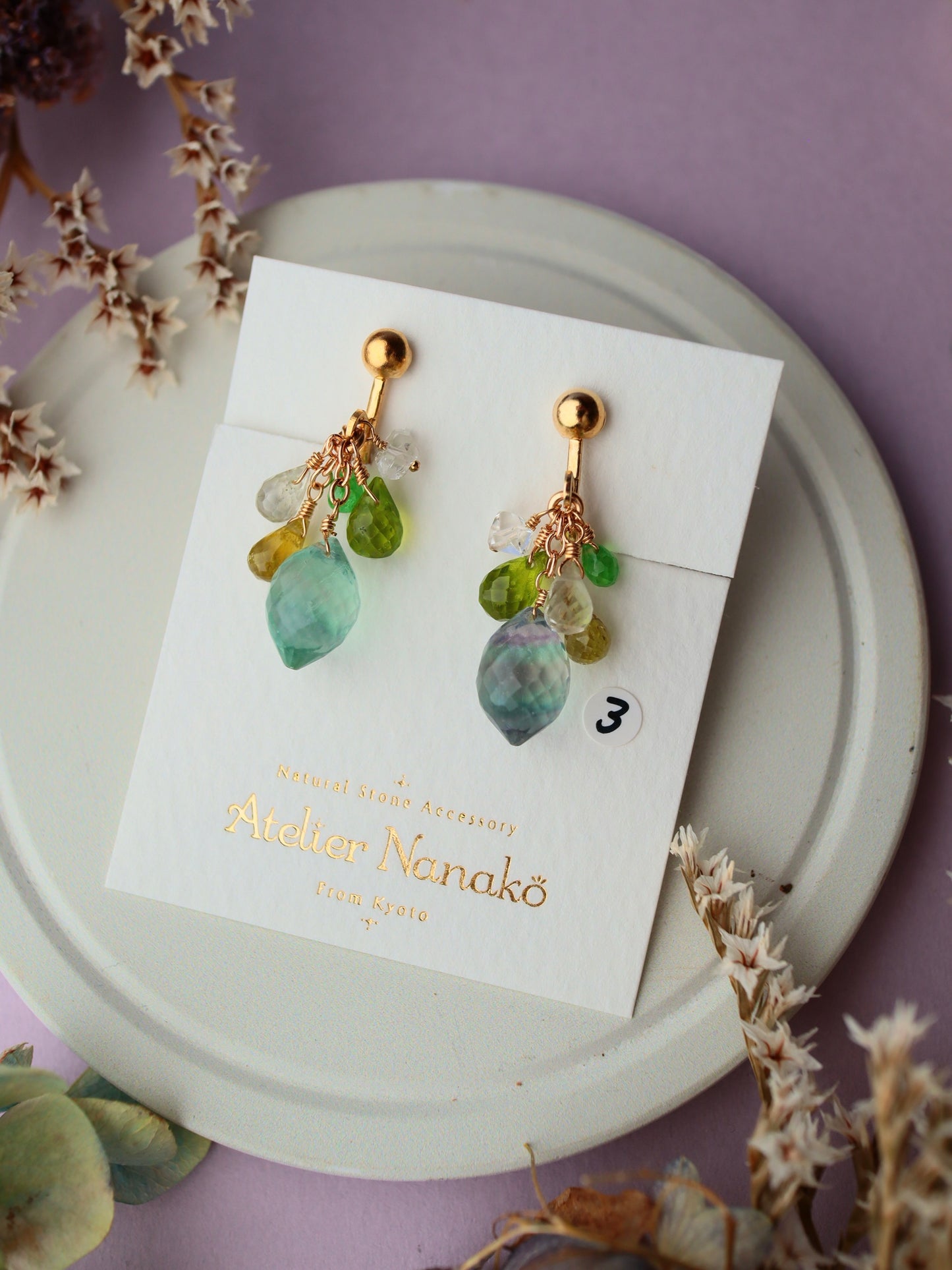③ Fluorite and yellow-green stone earrings