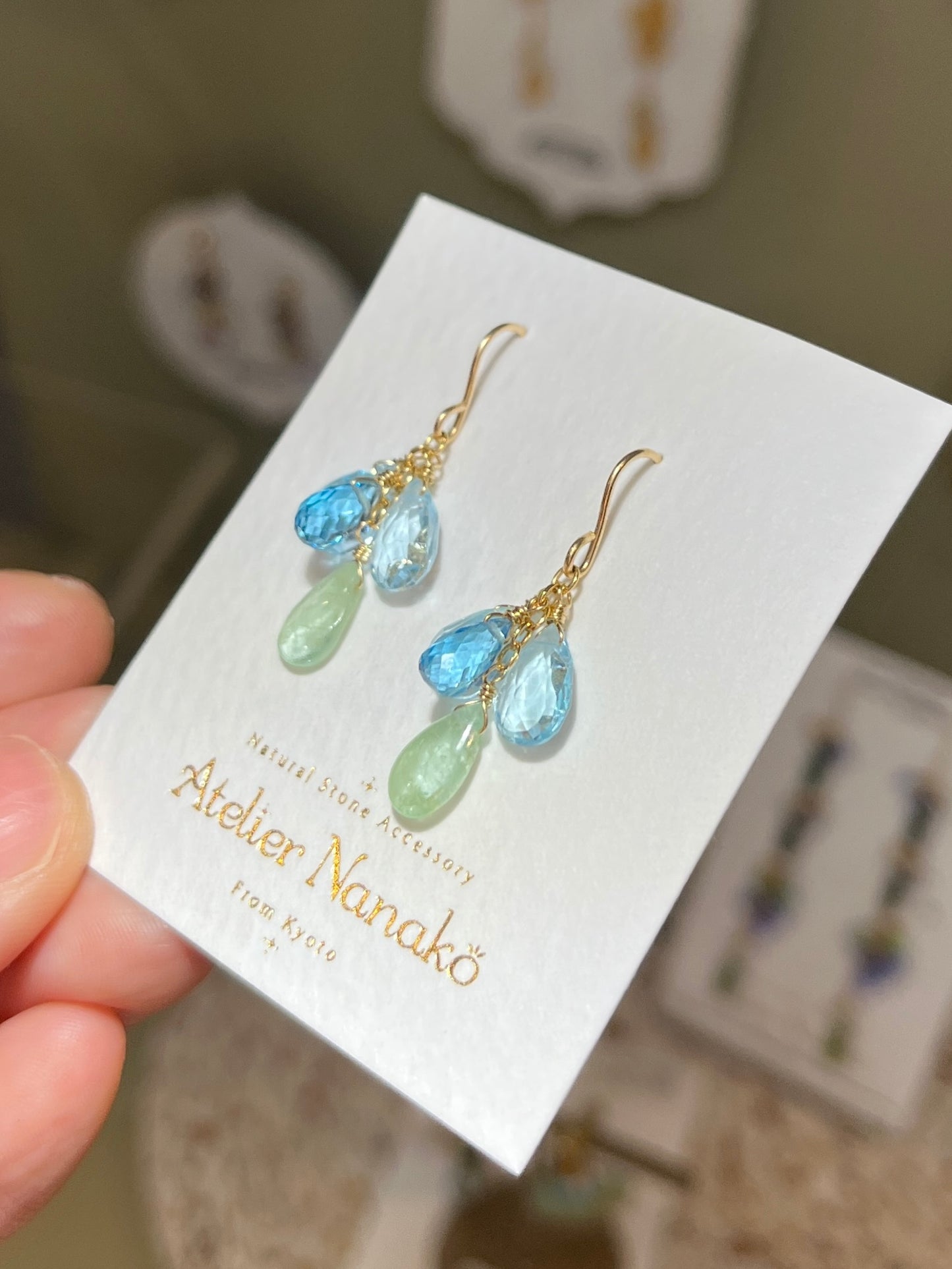 Blue Topaz and Emerald Earrings