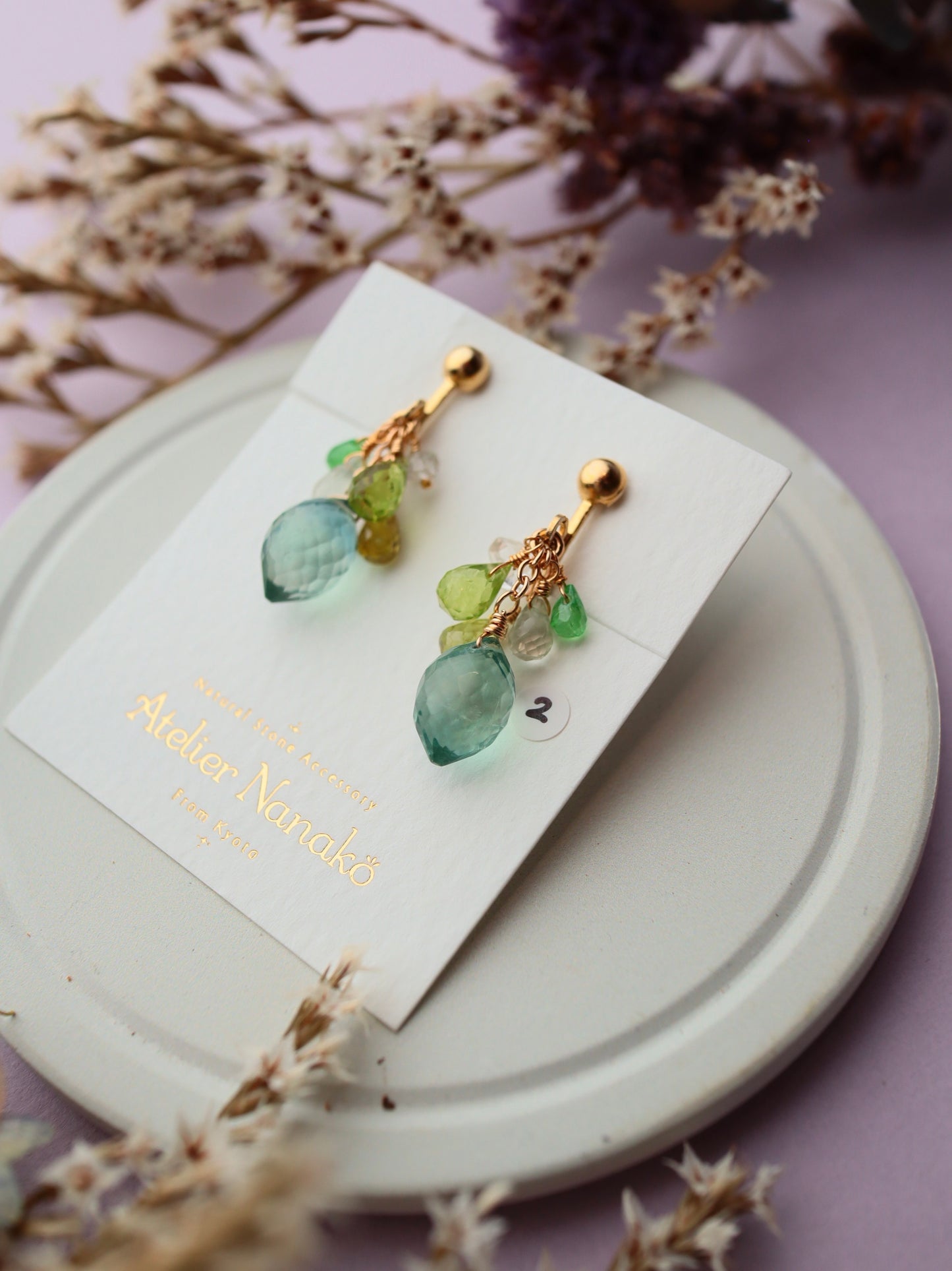 ② Fluorite and yellow-green stone earrings