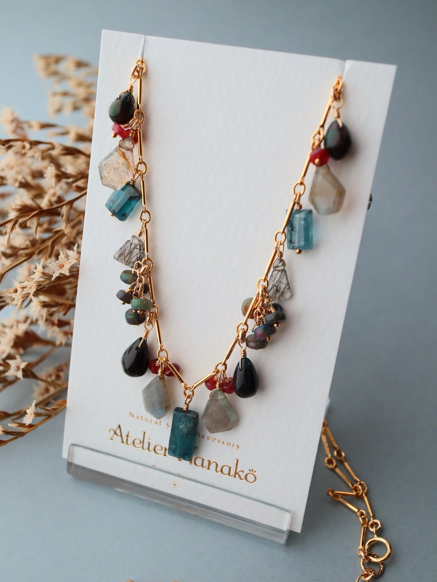 [The Lady with the Black Eyepatch] Black opal and deep blue kyanite round necklace