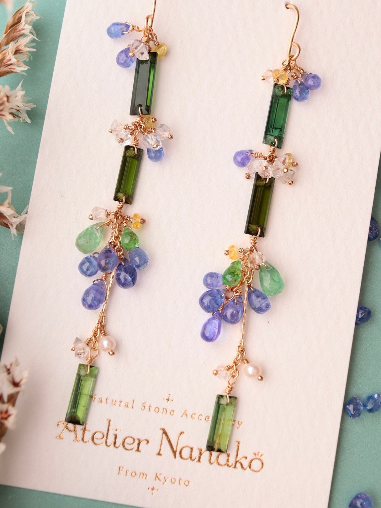 ②Green tourmaline and tanzanite earrings