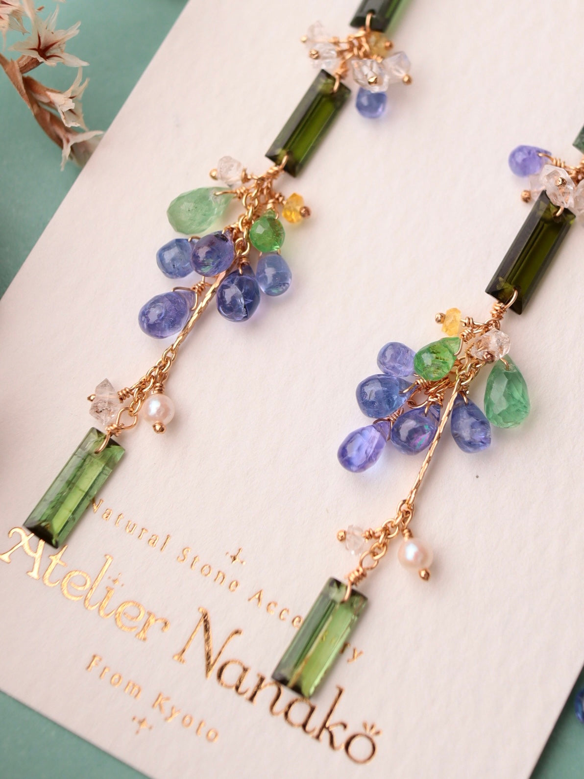 ②Green tourmaline and tanzanite earrings