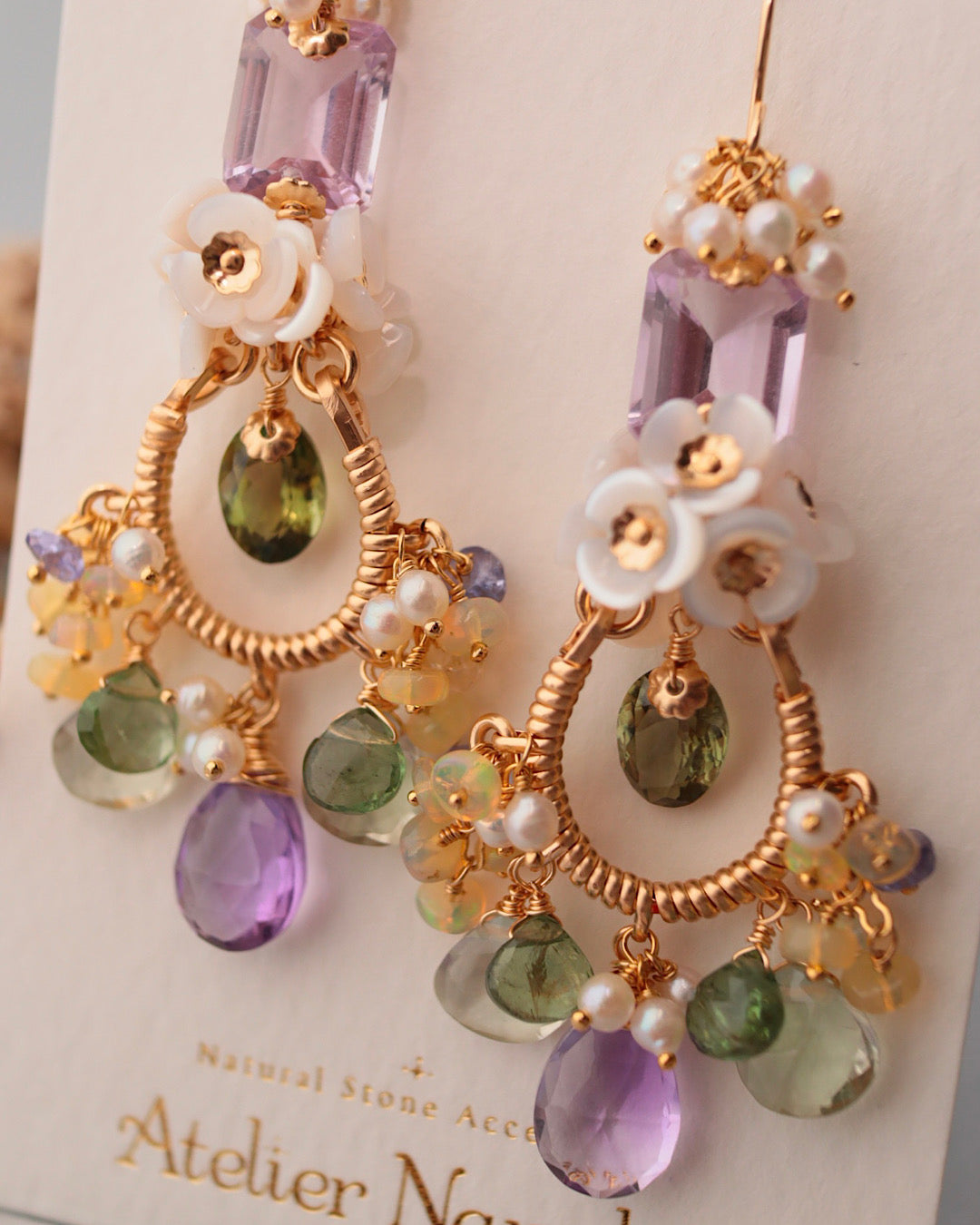 [One-of-a-kind] Chandelier earrings featuring olive green tourmaline and purple stones.