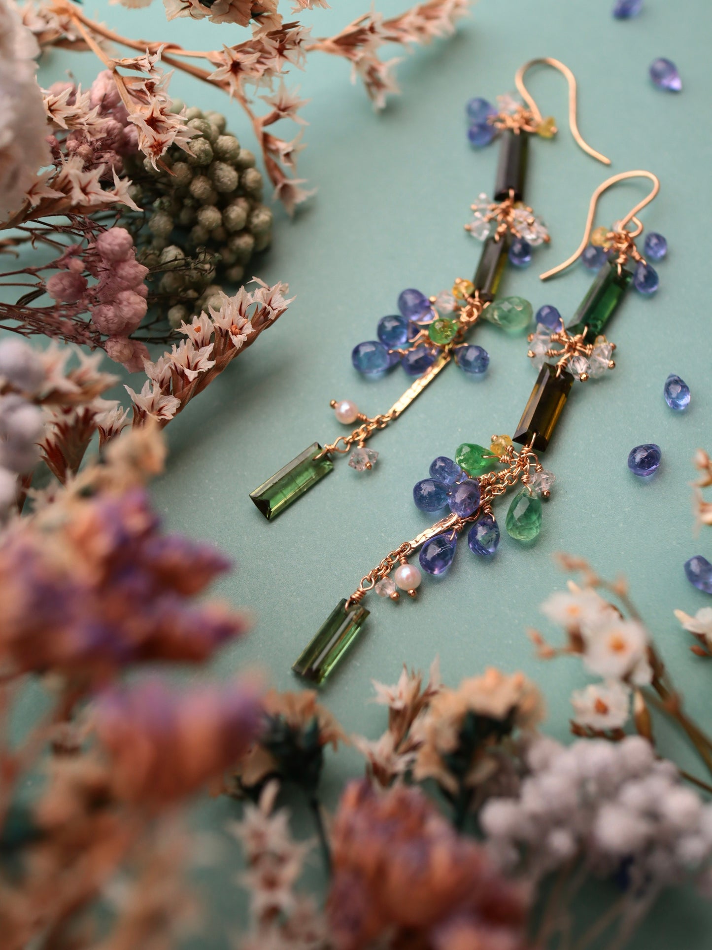 ②Green tourmaline and tanzanite earrings