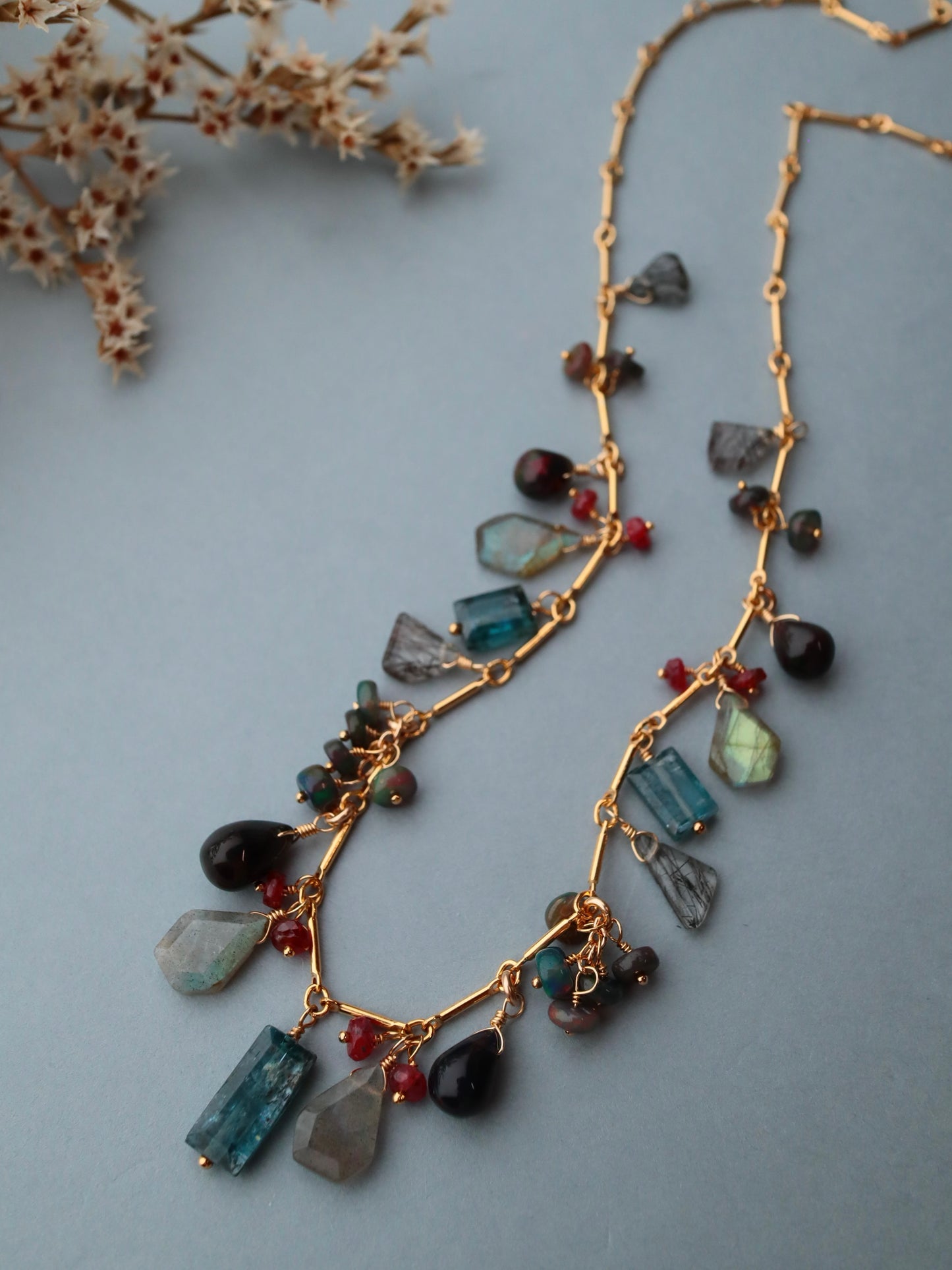 [The Lady with the Black Eyepatch] Black opal and deep blue kyanite round necklace