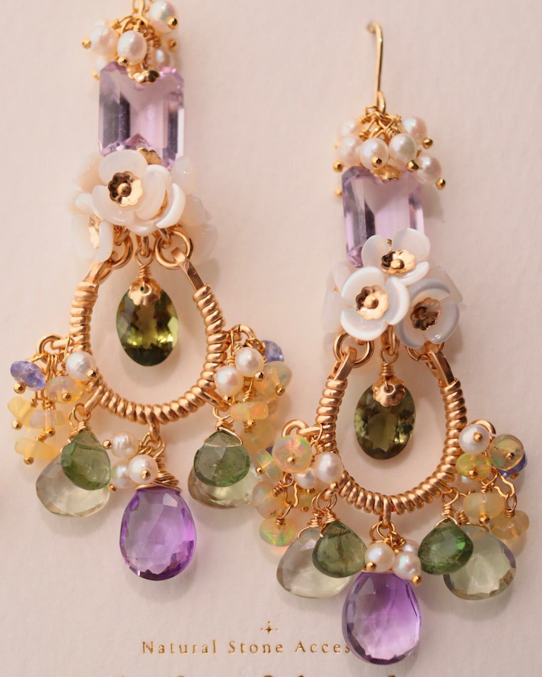 [One-of-a-kind] Chandelier earrings featuring olive green tourmaline and purple stones.