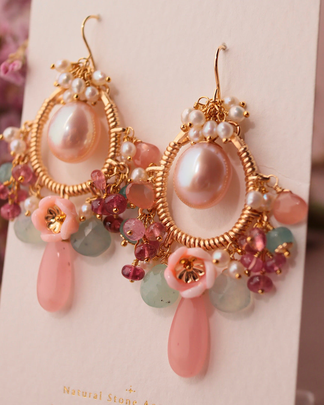 Romantic-hued chandelier earrings with large freshwater pearls