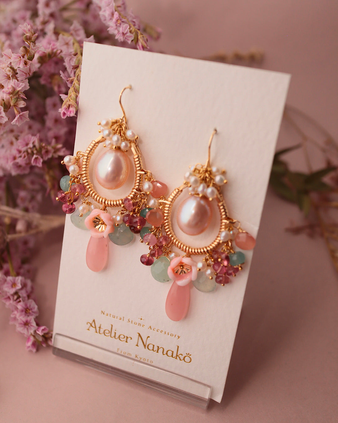 Romantic-hued chandelier earrings with large freshwater pearls