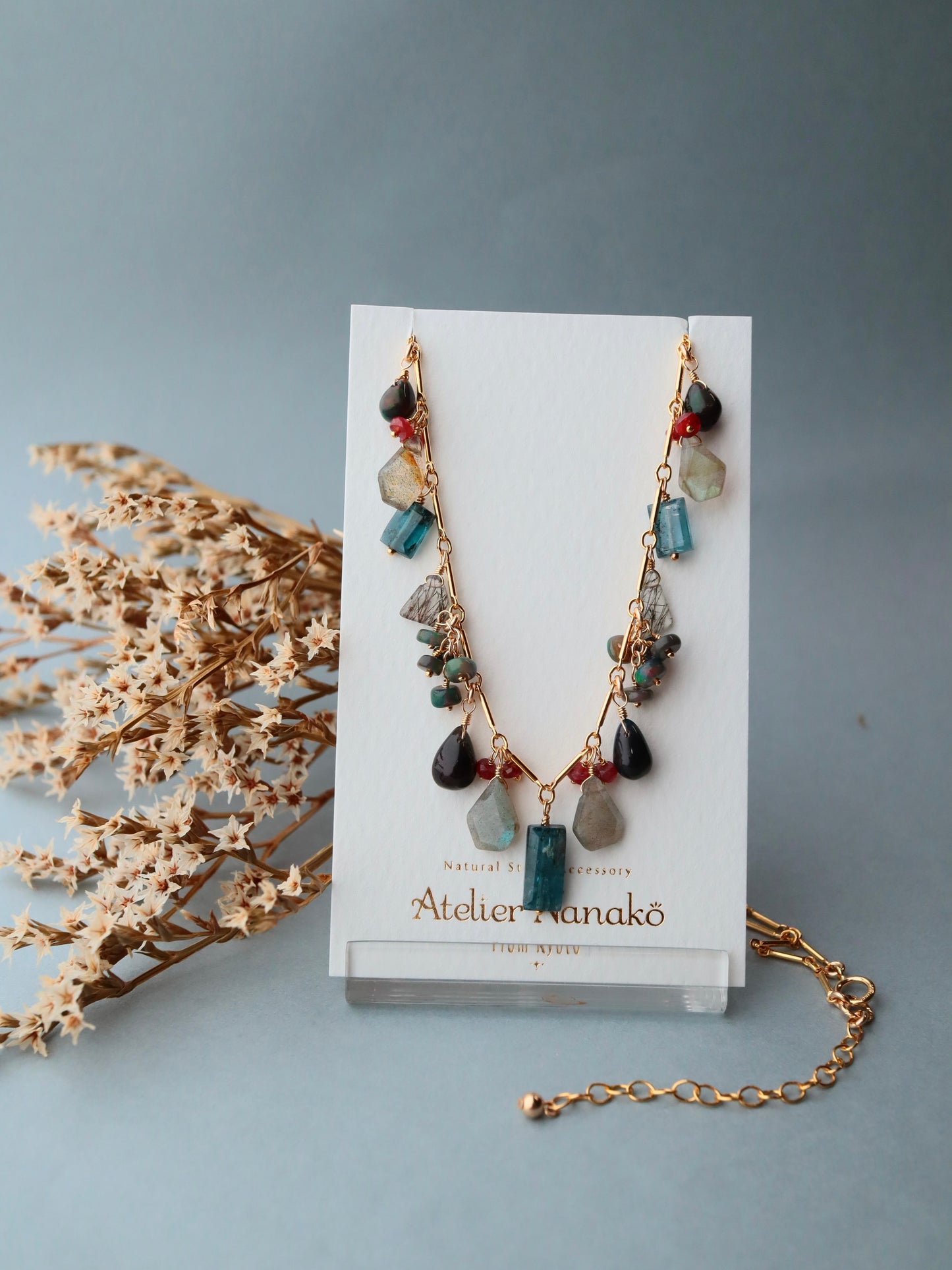 [The Lady with the Black Eyepatch] Black opal and deep blue kyanite round necklace