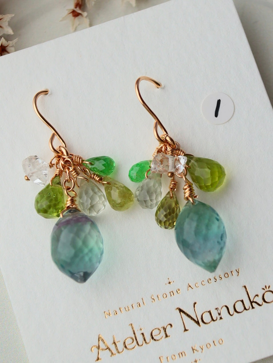① Fluorite and yellow-green stone earrings