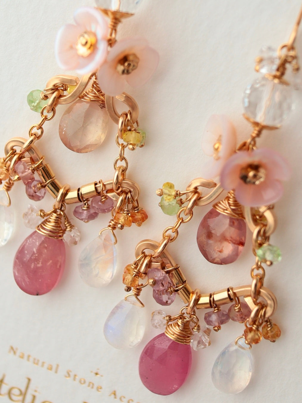 ① Pink sapphire chandelier earrings